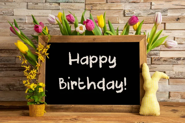 Tulip Flowers, Bunny, Brick Wall, Blackboard, Text Happy Birthday — Stock fotografie