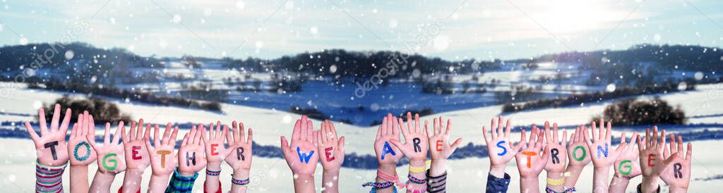 Children Hands Building Word Together We Are Stronger, Snowy Winter Background