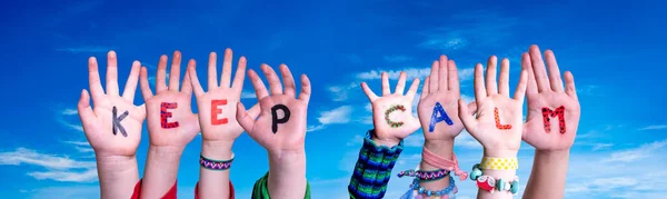 Kids Hands Holding Word Keep Calm, Blue Sky — Stock Photo, Image