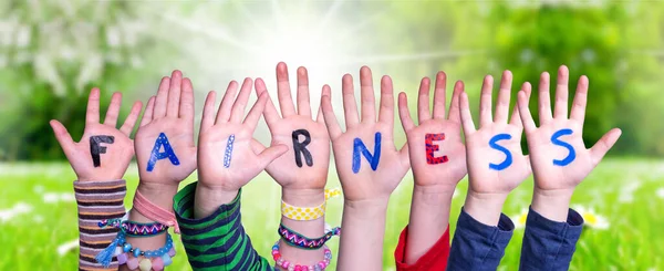 Children Hands Building Word Fairness, Grass Meadow — Stok Foto