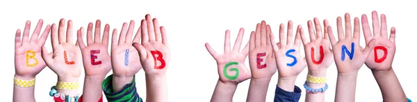 Kids Hands Holding Word Bleib Gesund Means Stay Healthy, Isolated Background — Stock Photo, Image