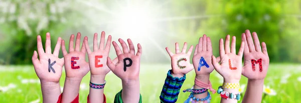 Kids Hands Holding Word Keep Calm, Grass Meadow — Stock Photo, Image