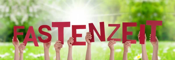 People Hands Holding Word Fastenzeit Means Fasting, Grass Meadow — Stock Photo, Image