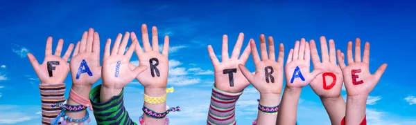 Children Hands Building Word Fair Trade, Blue Sky — Stock fotografie