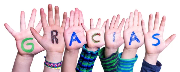 Viele Kinderhände Word Gracias bedeutet Danke, isolierter Hintergrund — Stockfoto