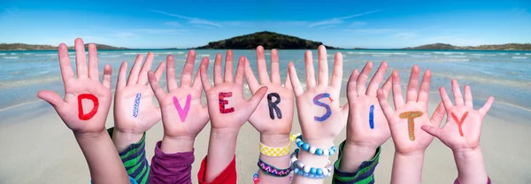 Children Hands Building Word Diversity, Ocean Background — Stock Photo, Image