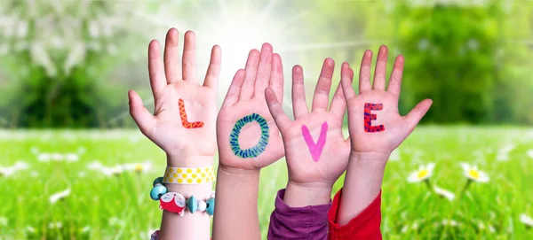 Children Hands Building Word Love, Grass Meadow — Stock Photo, Image