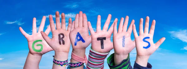 Children Hands Building Word Gratis Means Free, Blue Sky — Stock Photo, Image