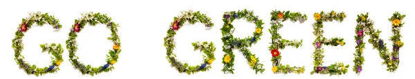 Fiore e fiore lettera costruzione parola Go Green — Foto Stock