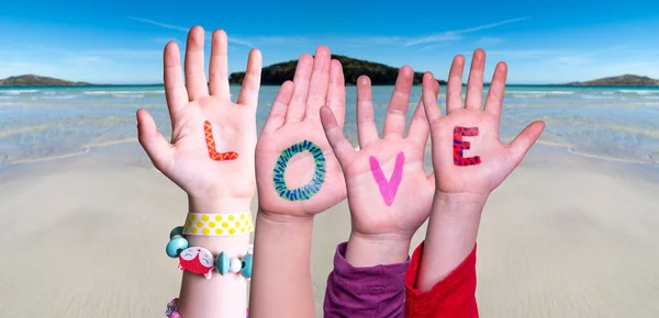 Children Hands Building Word Love, Ocean Background — Stock Photo, Image
