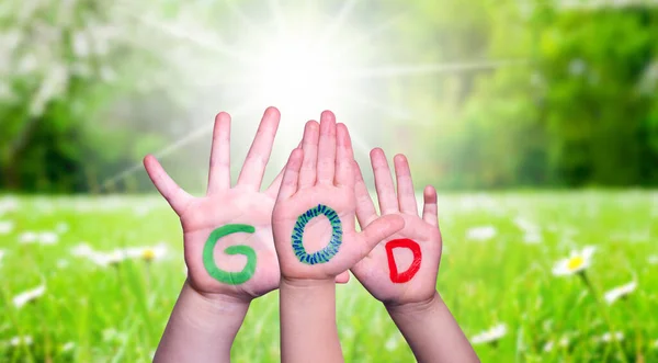 Children Hands Building Word God, Grass Meadow — Stock Photo, Image