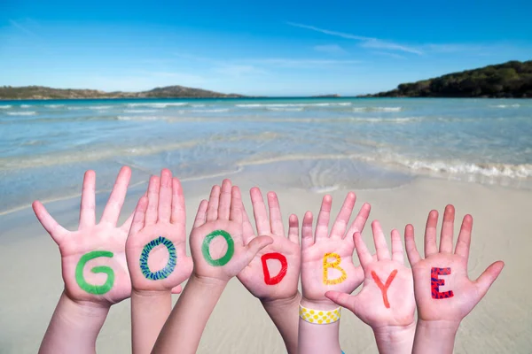 Bambini mani costruzione parola d'addio, sfondo dell'oceano — Foto Stock