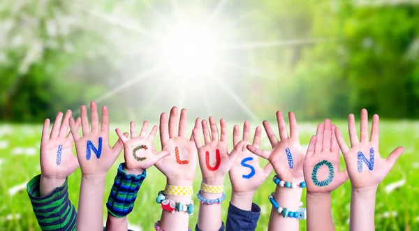 Children Hands Building Word Inclusion, Grass Meadow — Stock Photo, Image