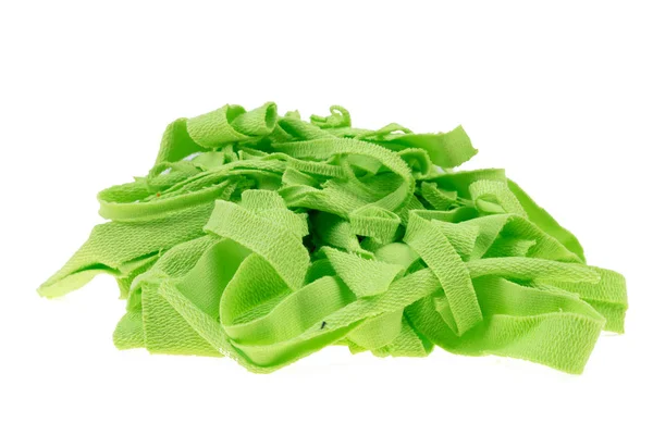 Маленькі обрізки зеленої тканини — стокове фото