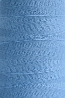 blue threads for sewing close-up, texture