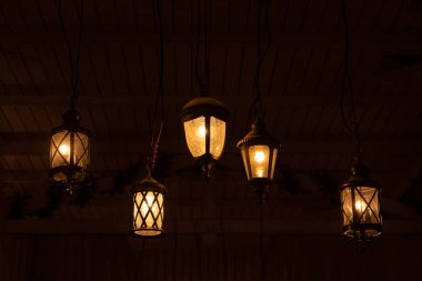 Vintage ceiling lights in the form of street lights. Lighting and interior decoration