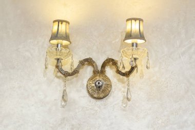 Wall lamp in vintage style on an white background.