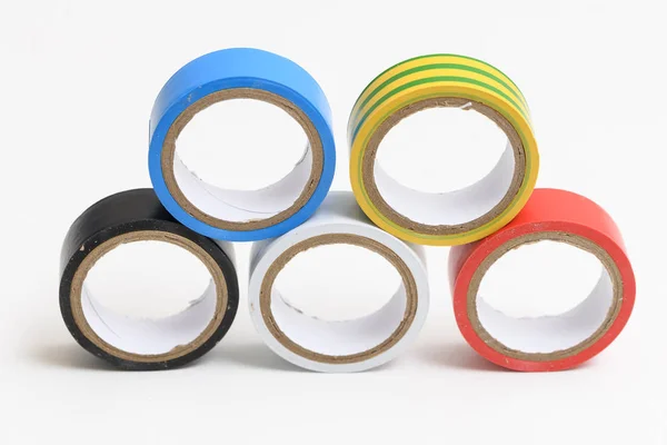 Different colored insulating tapes on white background — 图库照片