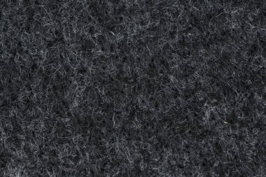 Doğal keçeli kumaşa dayalı siyah arkaplan