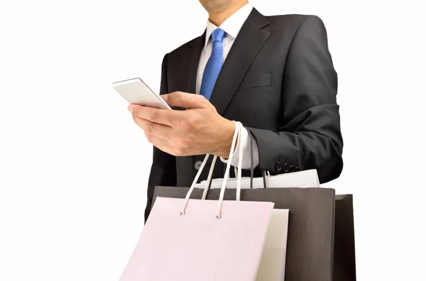 Shopping-Frau mit Handy — Stockfoto