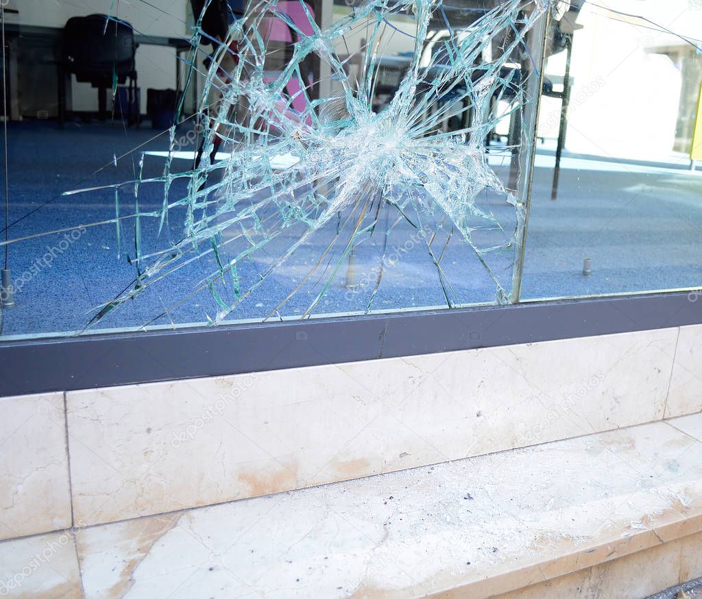 close up of broken office window glass