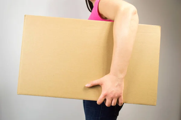 Woman holding the box — Stock Photo, Image