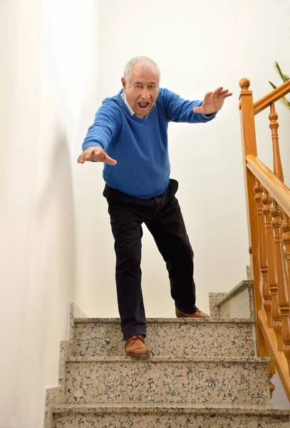 Senior man having a home accident — Stock Photo, Image