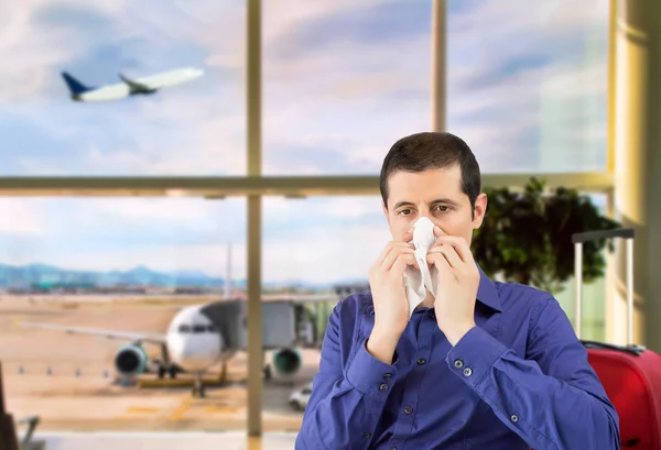 Sick man sneezing — Stock Photo, Image