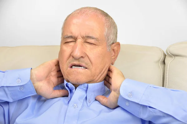 Senior man with neck pain — Stock Photo, Image