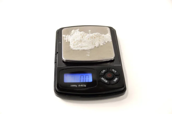 Measuring cocaine powder — Stock Photo, Image