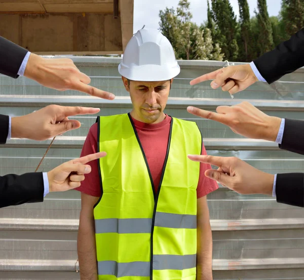 Many hands pointing the bullying a workman that is suffering  mo — Stock Photo, Image