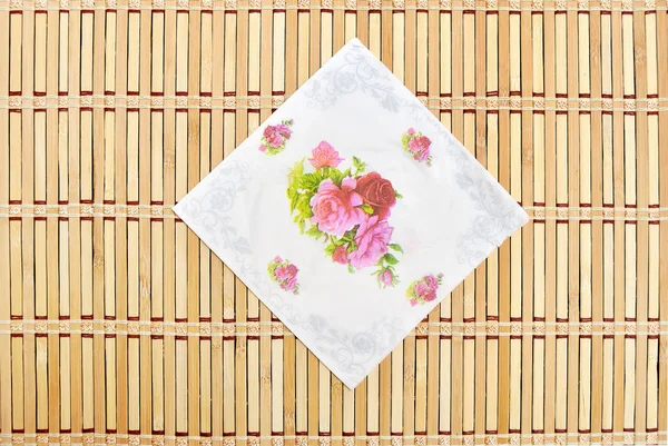 Tissue on bamboo mat — Stock Photo, Image