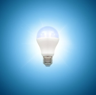 ampul üzerinde mavi arka plan, gerçekçi fotoğraf resim