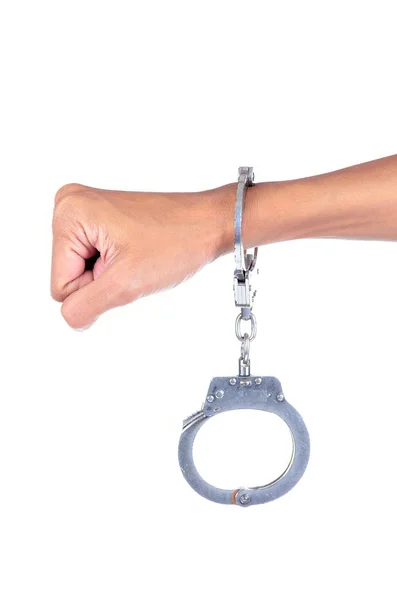 Male hand in police handcuffs showing gesture isolated on white background — Stock Photo, Image