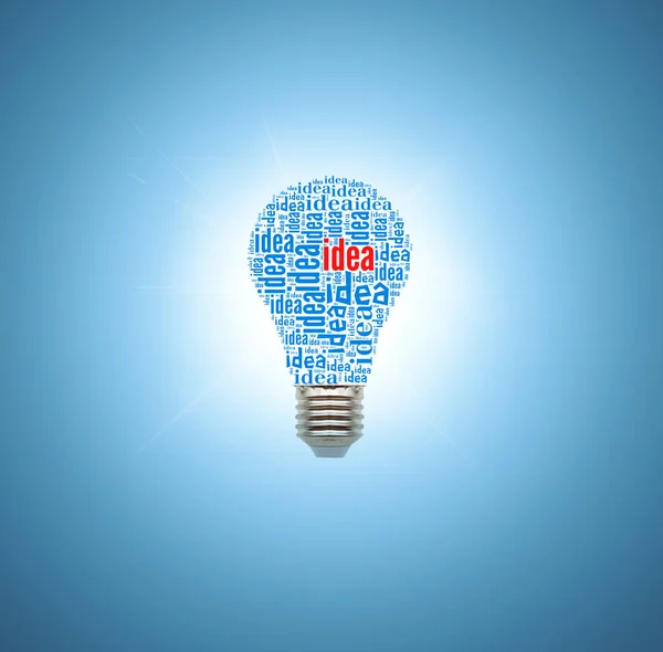 Lampa på blå bakgrund. Begreppet idéer — Stockfoto