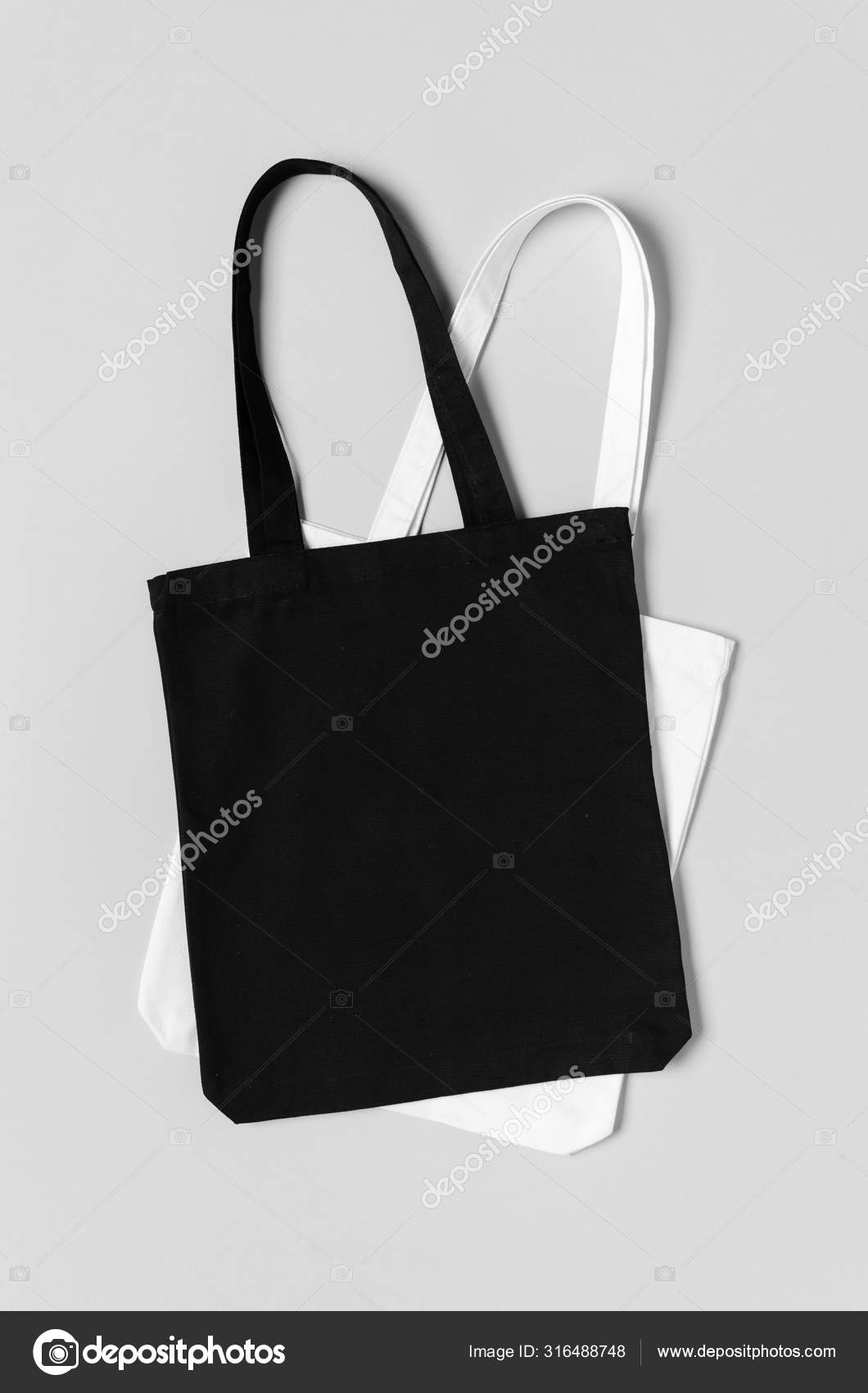 Download Black And White Tote Bags Mockup On A Grey Background Stock Photo C Shablonstudio 316488748 PSD Mockup Templates