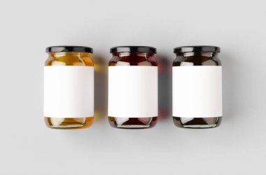 Boş etiketli bal kavanozları. Üç farklı renk..