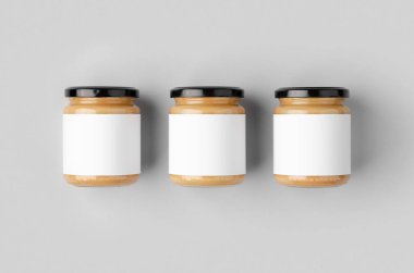 Fıstık, badem, fındık ezmesi kavanozu, boş etiketli maket. Üç kavanoz..