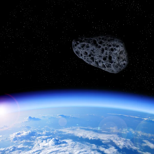 Asteroid approaching Earth — Stock Photo, Image