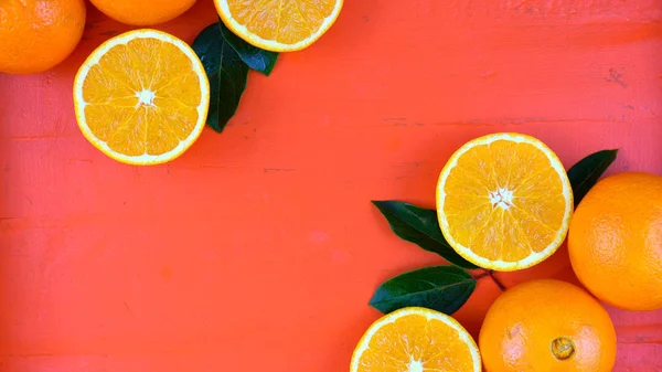 Oranges on orange wood table — Stock Photo, Image