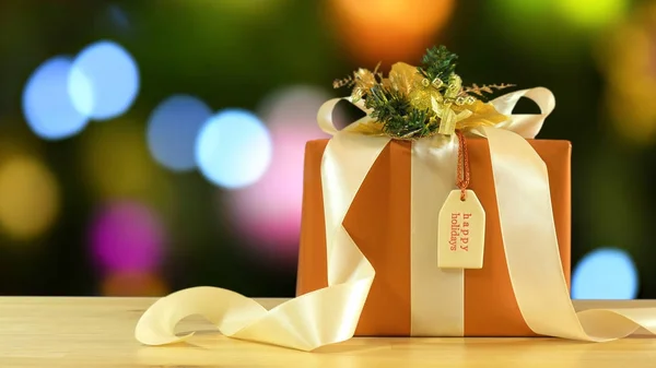 Modern gold, copper and white wrapped Christmas gift — Stock Photo, Image