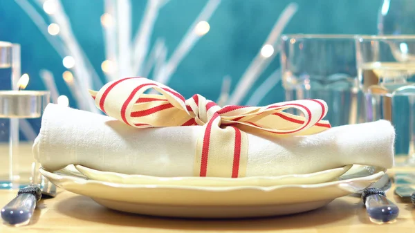 Holiday table place setting with focus on napkin — Stock Photo, Image