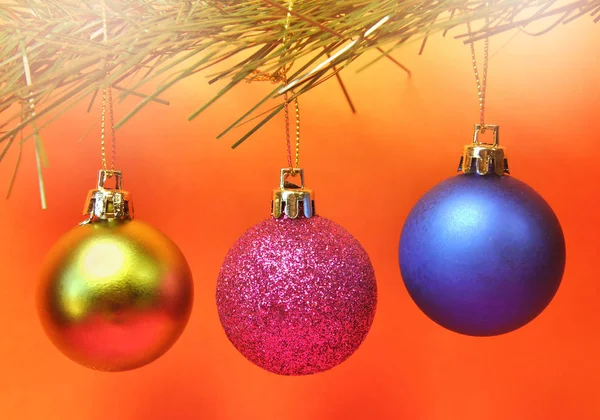 Christmas Bauble Ornaments with lens flare. — Stock Photo, Image
