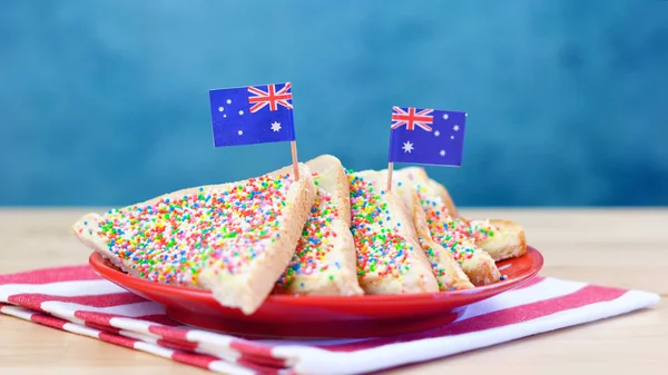 Iconic traditional Australian party food, Fairy Bread with flags. — Stock Photo, Image