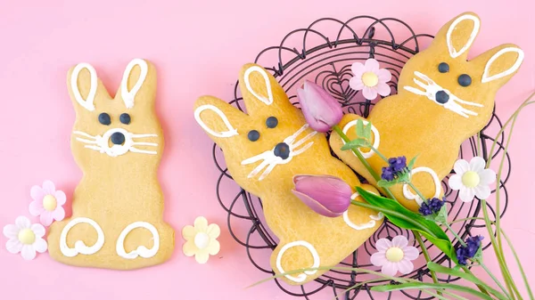 Happy Easter overhead with Easter Bunny cookies and decorations — Stock Photo, Image