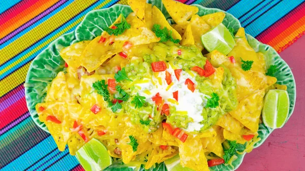 Cinco de Mayo party table with nachos food platter. — Stock Photo, Image