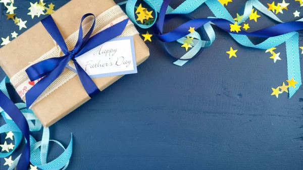 Fathers Day overhead with decorated borders on dark blue wood table. — Stock Photo, Image