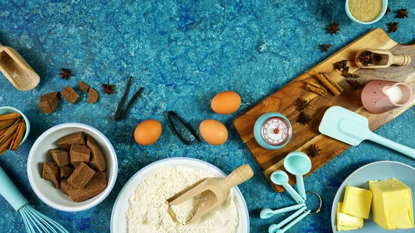 Baking flatlay creative composition for chocolate recipes on vintage blue table. — Stock Photo, Image