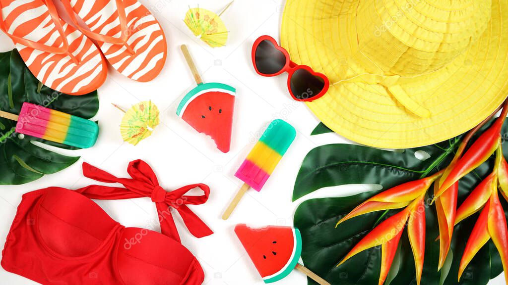 Summer vacation resort theme flat lay in bright summery colors.