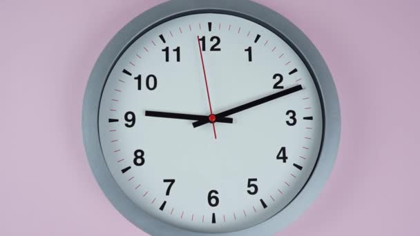 Closeup Nine Clock Wall Clock Pink Background Time Lapse Minutes — Stock Video